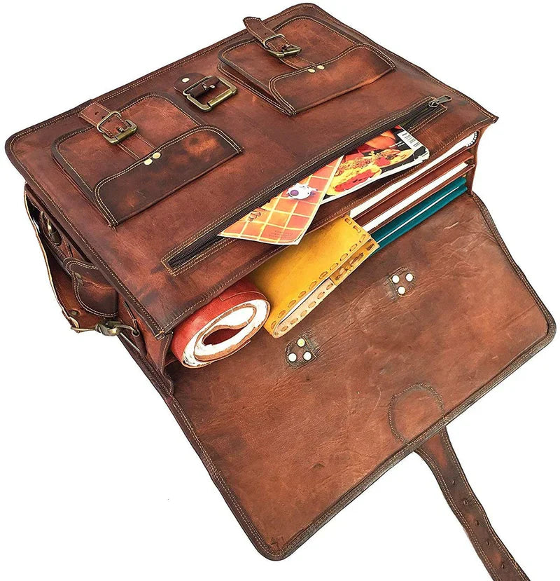Brown leather briefcase with items inside on a white background
